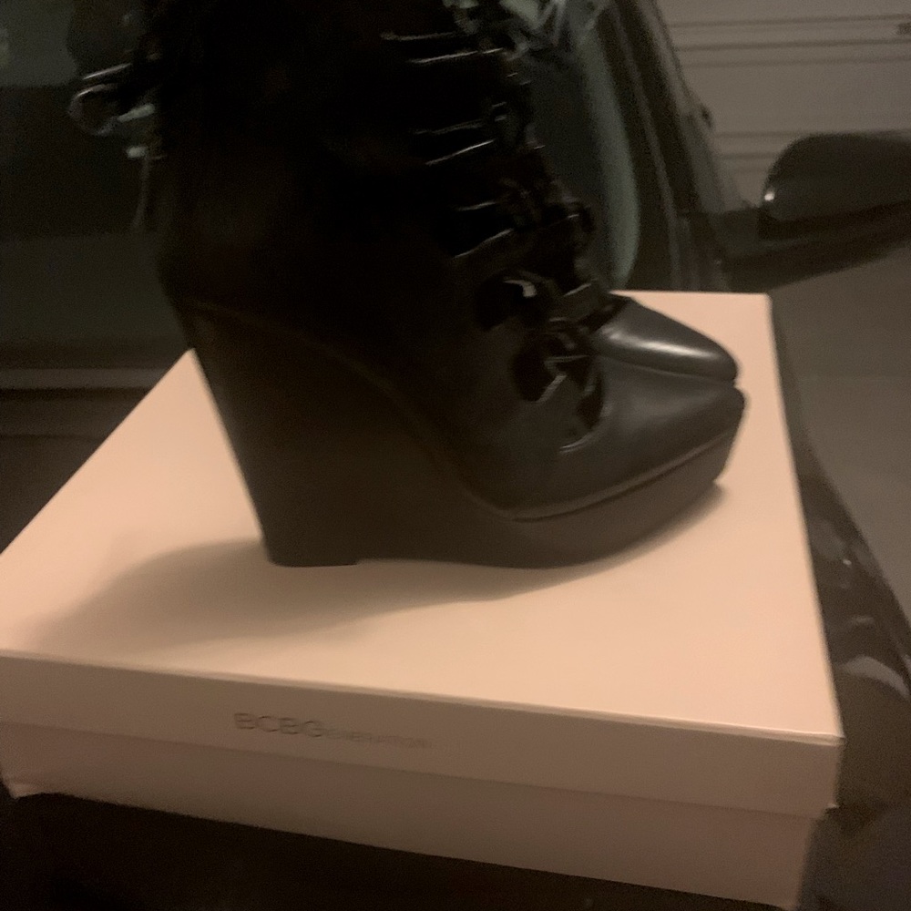 Black leather wedge heels